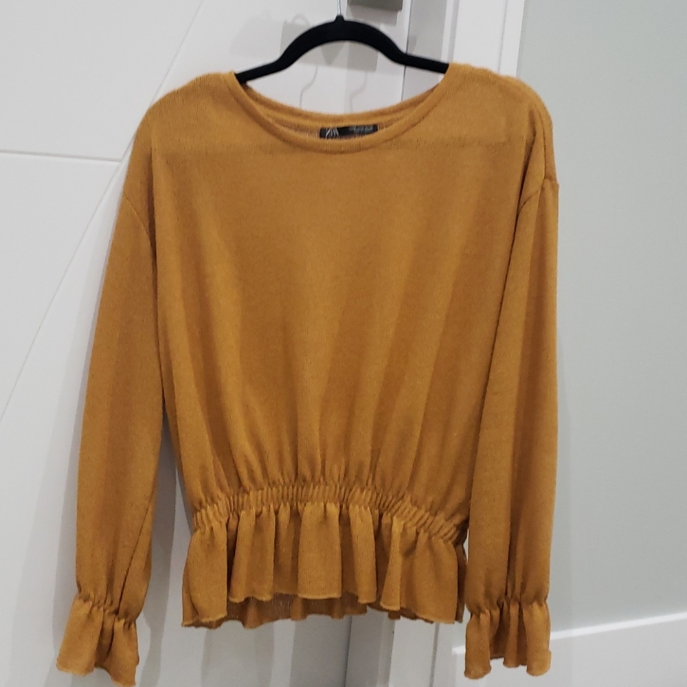 Peplum style top